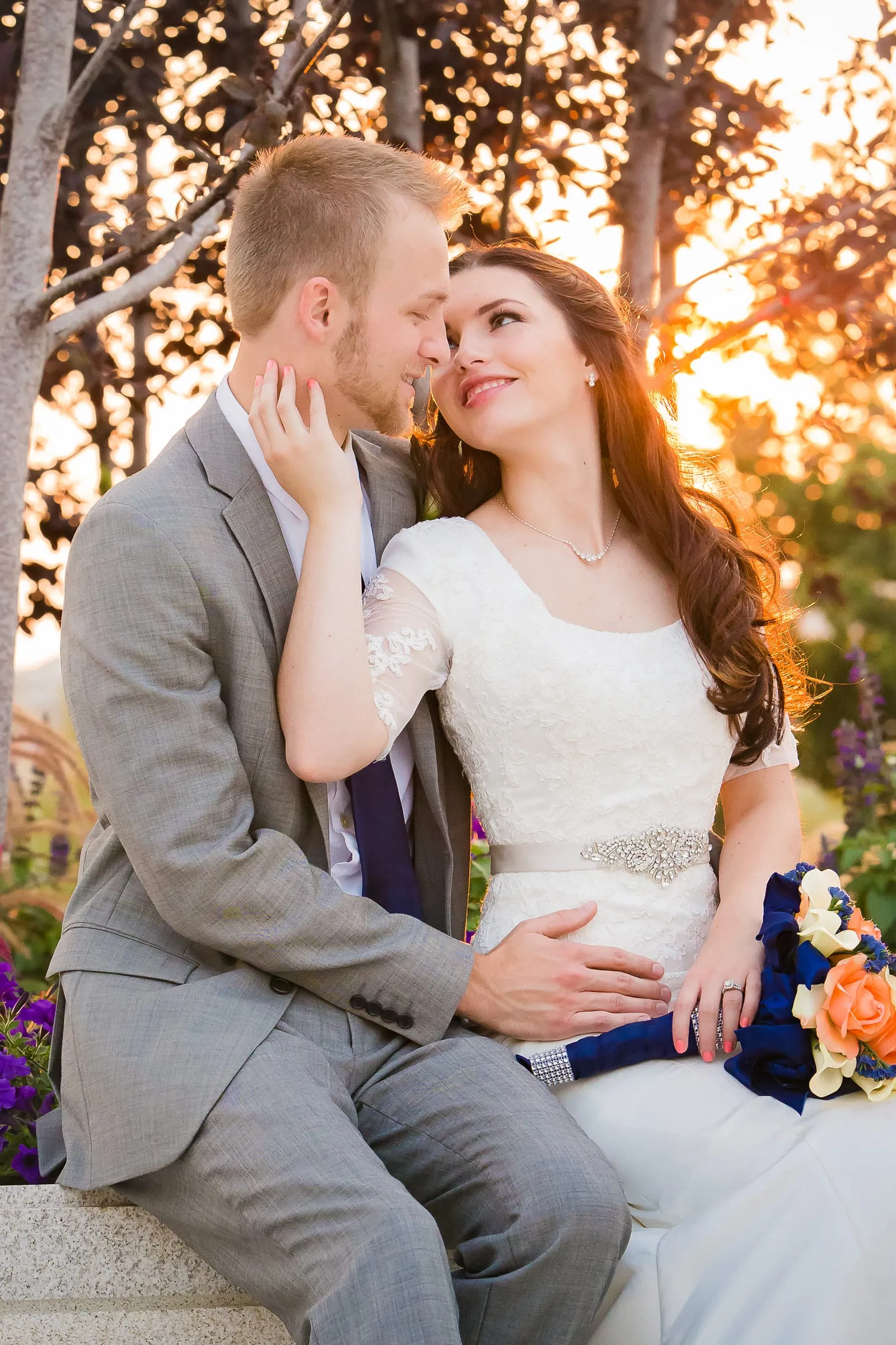 Bride and groom in warm autumn sunlight