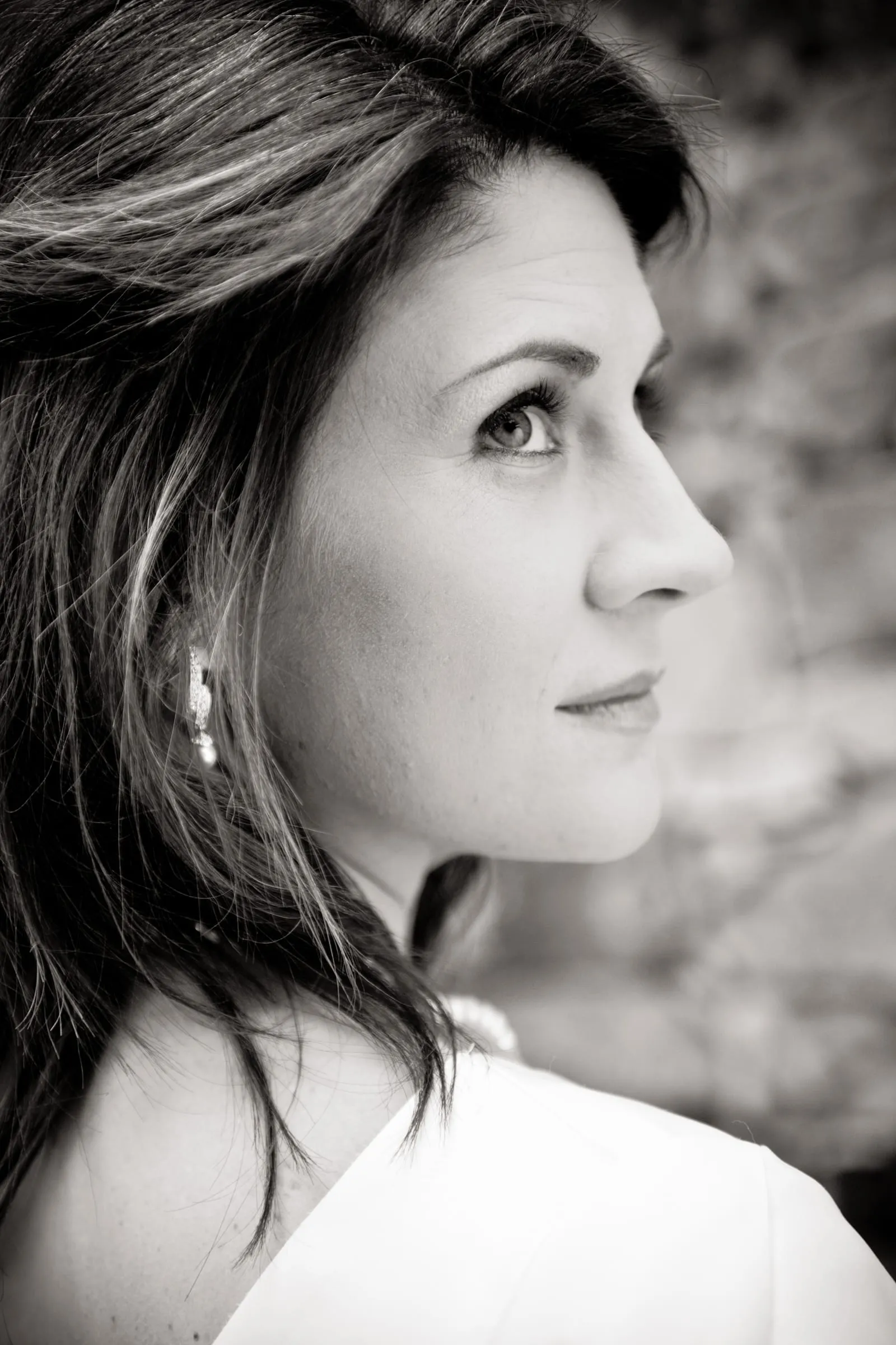 Black-and-white profile portrait of a bride